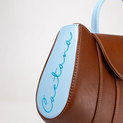 Tatu bag marrón + azul celeste